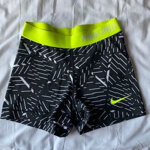 Black and White /Neon Yellow Nike Pro’s Size Small